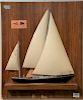 Peggy and David Rockefeller half hull sailboat model of their sailboat, TAR II, having Seal Harbor Yacht Club flag and the Rockefell...