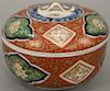 Small Imari porcelain covered tureen/bowl, blue, iron red, and green painted, having molded handle, 18th/19th century. height 4 1/2...