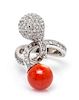 An 18 Karat White Gold, Coral and Diamond Ring, 5.10 dwts