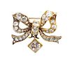 A 14 Karat Yellow Gold, Diamond and Pearl Butterfly Brooch, 4.00 dwts.