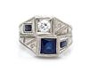 A 14 Karat White Gold, Diamond and Synthetic Sapphire Ring, 4.60 dwts.