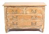 A Provincial Style Carved and Distressed Finish Chest of Drawers height 34 x width 50 1/2 x depth 21 inches.