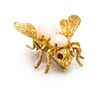 * An 18 Karat Yellow Gold, Coral and Ruby Bee Brooch, 6.50 dwts.