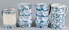Four blue and white spongeware pitchers