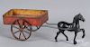 Cast iron horse drawn tin cart
