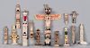 Ten Northwest Coast miniature carved totem poles