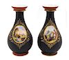 A Pair of Continental Painted Porcelain Vases Height 13 inches.