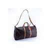Louis Vuitton Brown Monogram Coated Canvas Keepall Bandouliere 50. Golden brass hardware. The inter