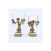 Pair of Gilt Brass Putti Two Light Electrified Candelabras. Each have been repaired, residue to sur