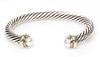 A Sterling Silver, 14 Karat Yellow Gold and Cultured Pearl 'Cable Classics' Bracelet, David Yurman, 28.70 dwts.