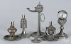 Six pewter oil lamps