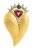 * An 18 Karat Yellow Gold, Tourmaline and Diamond Pendant/Brooch, JF, 11.00 dwts.