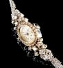 A VINTAGE 14K WHITE GOLD AND DIAMOND LADY'S ELGIN WATCH,
