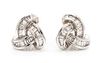 A Pair of 18 Karat White Gold and Diamond Earclips, 4.60 dwts.
