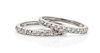 A Pair of 18 Karat White Gold and Diamond Bands, 2.70 dwts.
