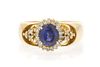 An 18 Karat Yellow Gold, Sapphire and Diamond Ring, 3.50 dwts.