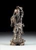 A CHINESE CARVED HARDWOOD FIGURE OF A SAGE IMMORTAL, 20TH CENTURY,