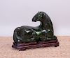 LARGE CHINESE DARK GREEN JADE CARVING OF A HORSE