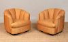 PAIR OF SILK-UPHOLSTERED SWIVEL ARMCHAIRS