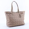 Dior Beige Cannage Coated Canvas Panarea Tote GM. Gold tone hardware, tan canvas interior with zippered and patch pockets, beige leather handles.