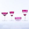 Forty Two (42) Piece Bohemian Style Cranberry to Clear Stemware. Includes: 9 red wine glasses 6-3/4" H, 12 white wines glasses 5-1/2" H, 9 champagne g
