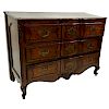 19th Century French Carved Walnut Commode/Chest of Drawers with Bronze Pulls. Three large fitted drawers and stands on front cabriole and rear bracket