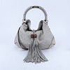 Gucci Beige Monogram Leather Indy Hobo Guccissima MM Bag. Gold tone hardware.