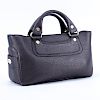 Celine Dark Bronze Leather Boogie Handbag. Gold tone hardware, signature fabric interior with zippered and patch pockets.