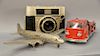 Three piece toy group including Buddy L Texaco Toy Fire Chief truck (lg. 25in.), Agfa Optima Compur advertising store display camera...