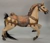 Small carousel horse with carved lion head, painted and gesso. ht. 36in., lg. 48in.