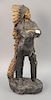 Large chief Indian standing bronze figure wearing full headdress. ht. 30in.