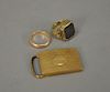 Two 14 karat gold mans rings, one mounted with bloodstone and belt buckle. 31.4 grams