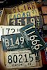 Two box lots of twenty-four vintage Vermont license plates from 1919 to 1953.