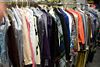 Clothing rack of women's clothes to include blazers, dresses, blouses, sweaters, etc. by designers that include Draper's Damons, Pri...