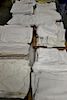 Table lot of linens to include napkins, tablecloths, table runners, etc.