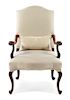 A Regence Walnut Armchair Height 44 1/2 inches.