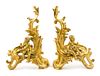 A Pair of Louis XV Style Gilt Bronze Chenets Height 19 1/2 x width 23 inches.