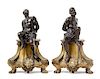 A Pair of French Gilt and Patinated Bronze Figural Chenets Height of taller 22 inches.