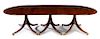* A Regency Style Mahogany Dining Table Height 29 1/2 x width 52 1/2 x length 142 inches (fully extended).