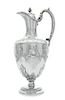 A Victorian Silver Claret Jug, Martin, Hall & Co., London, 1870, the hinged lid with a pinecone finial, the baluster form body c