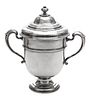 * An English Silver Twin-Handled Cup and Cover, Lionel Alfred Crichton, London, 1924, the domed lid with a knopped finial above
