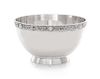 A George V Silver Bowl, Wakely & Wheeler, London, 1935, Retailed by Asprey, the rim worked to show a band of Celtic motifs, rais