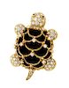 An 18 Karat Yellow Gold, Onyx, Diamond and Ruby Turtle Pendant/Brooch, Hammerman Brothers, 11.10 dwts.