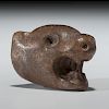A Mississippian Wolf Effigy Pipe