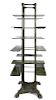 A French Painted Iron Etagere, Height 85 x width 27 3/4 x depth 31 5/8 inches.