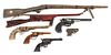Seven Decorative and Toy Guns Length of largest 40 1/2 inches
