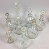 Eight Blown Colorless Glass Decanters