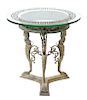 * A Pompeiian Style Patinated Bronze Table Height 29 x diameter of top 30 inches.