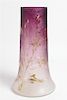 * An Art Nouveau Gilt Decorated Mottled Glass Vase Height 10 inches.