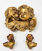 * Three Giltwood Putto Masks Height of tallest 12 inches.